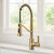 Kraus Britt™ Commercial Style 2-Function Single Handle Pull Down Kitchen Faucet, Spot Free Brushed Brass In Use Kitchen Angle View