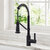 Kraus Britt™ Commercial Style 2-Function Single Handle Pull Down Kitchen Faucet, Matte Black In Use Kitchen Angle View