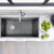 Nantucket Sinks Cape 34'' W Premium Rectangle Fireclay Dual Mount Kitchen Sink, Matte Concrete w/ Drain and Bottom Grid, 34-1/4'' W x 18-1/2'' D x 10'' H, 34'' Matte Concrete In Use Overhead View