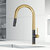 Vigo Single Handle Pull-Down Sprayer Kitchen Faucet in Matte Brushed Gold and Matte Black, Installed Angle View