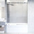 Vigo Elan 60'' W x 66'' H Frameless Right Sliding Tub Door in Stainless Steel Hardware with Fluted Glass, In Use Illustration