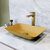 VIGO Sottlie MatteShell™ Collection Gold Vessel Bathroom Sink with Norfolk Bathroom Faucet and Pop-up Drain in Matte Brushed Gold, Installed Angle View
