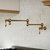 Whitehaus Vintage III Plus Wall Mounted Retractable Spout Pot Filler with Lever Handles, Antque Brass, Extended View